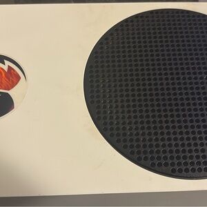 Sleek White Gaming Console with Black Detailing